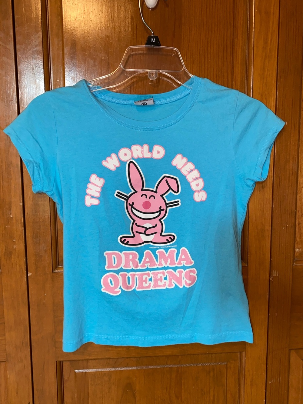 It’s Happy Bunny Baby Tee.